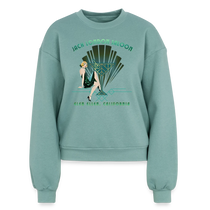 Sonoma Rebel Jack London Saloon Art Deco women's crewneck sweatshirt in light teal, featuring a graphic of a flapper girl and martini glass.