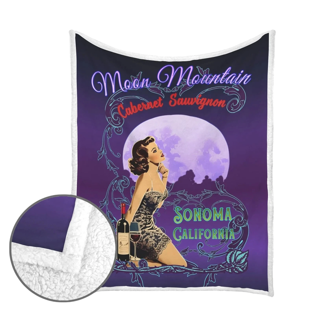 Sonoma Rebel Moon Mountain Cabernet Sauvignon pinup fleece blanket with sherpa lining, featuring a vintage style woman, wine bottle, and moon.