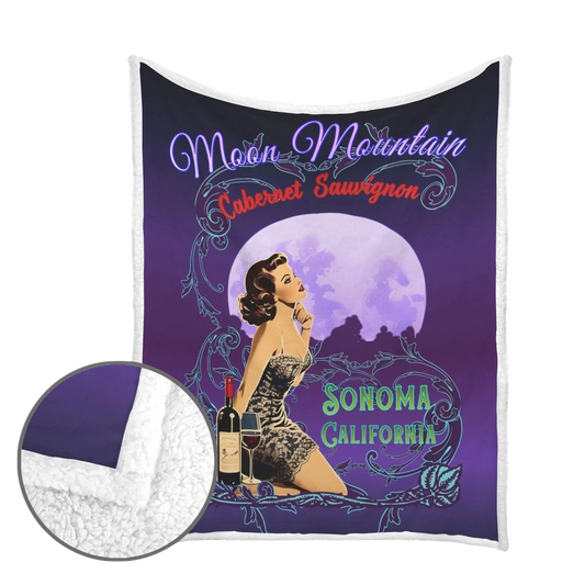 Sonoma Rebel Moon Mountain Cabernet Sauvignon pinup fleece blanket with sherpa lining, featuring a vintage style woman, wine bottle, and moon.