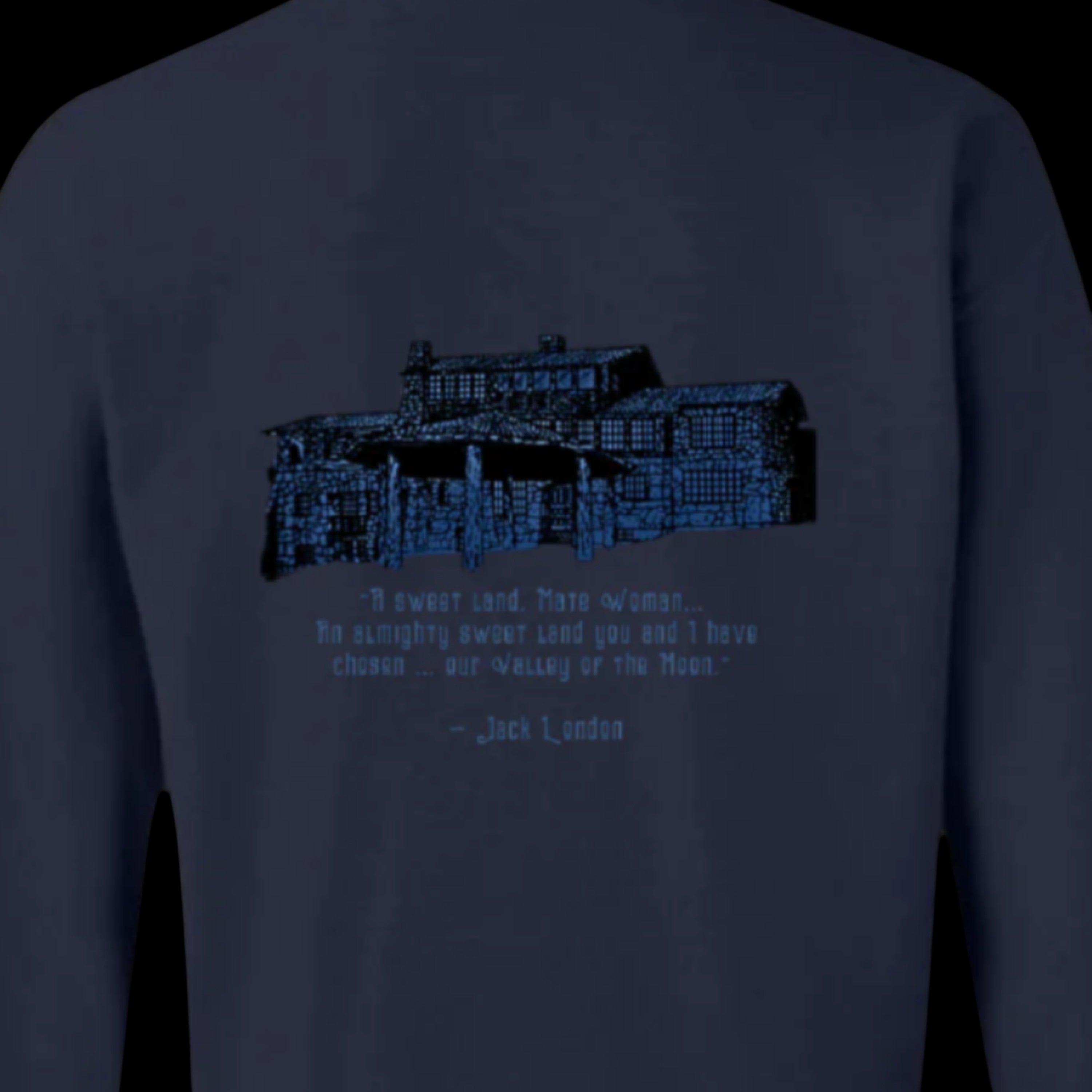 Sonoma Rebel navy blue crewneck sweatshirt with a graphic of a large house and text quote from Jack London.