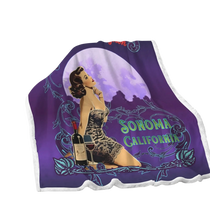 Sonoma Rebel vintage pinup fleece blanket with a woman, wine bottle, and glass under a large moon. Features "Sonoma California" text.
